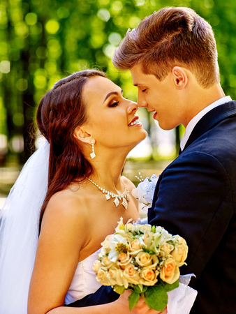 Bride and groom with flower summer  outdoor.の写真素材
