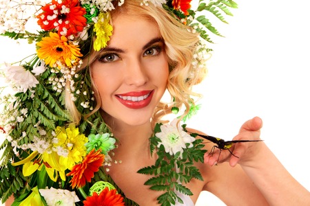 Blond woman with butterfly on hand and  flower  .  Isolated.の写真素材