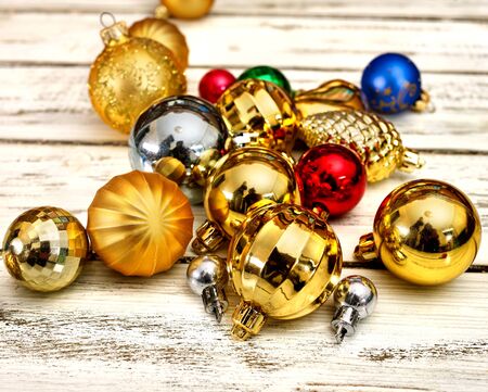 Christmas decorations design of Xmas group balls ornaments on white wooden boards . Square frame .の写真素材