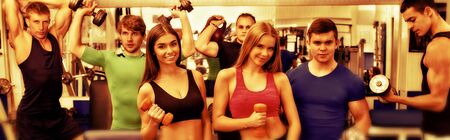 Sport gym with group of people friends. Horizontal long frame banner.の写真素材