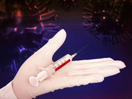 Vaccine pneumonia sars virus on hand in medical glove. Pandemic covid 19 after vaccination coronavirus.の写真素材