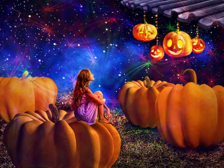Kid on pumkin in halloween night dreems about fall harvest holiday. Magic jack lantern pumpkin decoration roof light by girl. Autumn children sitting on star sky background.の写真素材