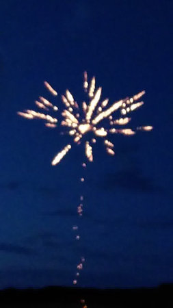 Fireworks in the night sky. Blurry fireworks on the night sky.の写真素材