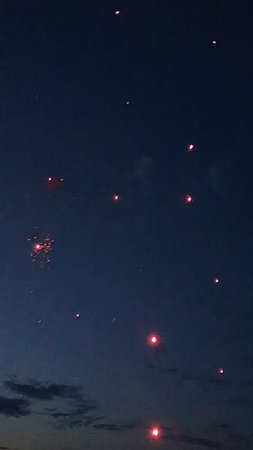 fireworks in the night sky with stars and a lot of smokeの写真素材