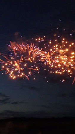 Fireworks in the night sky as a celebration of the New Yearの写真素材