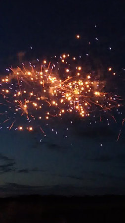 fireworks in the night sky, closeup of photo with long exposureの写真素材