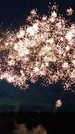 Fireworks light up the sky with dazzling display of various colors.の写真素材