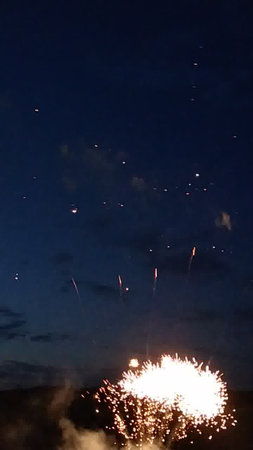 fireworks in the night sky, closeup of photo with fireworkの写真素材