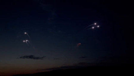 fireworks in the night sky, shooting star in the night skyの写真素材