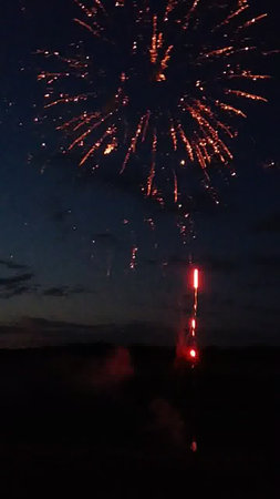 fireworks in the night sky on the shores of the Baltic Seaの写真素材