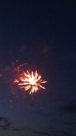 Fireworks in the night sky. New Year's Eve celebration.の写真素材