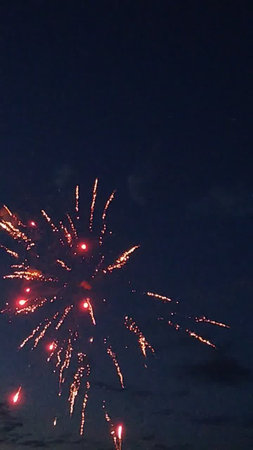 Fireworks in the night sky, New Year's Eve celebration.の写真素材