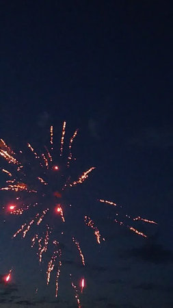 Fireworks in the night sky, celebrating the New Year and Christmasの写真素材
