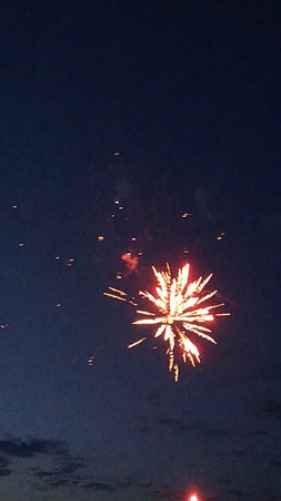 fireworks in the night sky, beautiful holiday firework in the night skyの写真素材