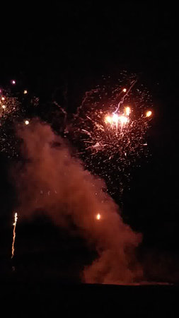 Fireworks in the night sky. New Year and Christmas celebration.の写真素材