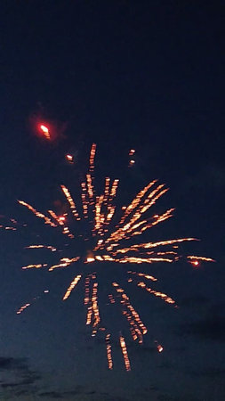 fireworks in the night sky at the end of the summer holidayの写真素材