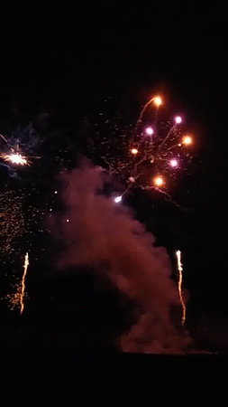 Fireworks in the night sky. New Year and Christmas celebration.の写真素材