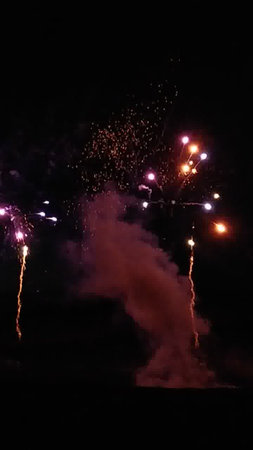 Fireworks in the night sky. New Year's Eve celebration.の写真素材