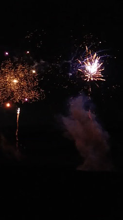 fireworks in the night sky, fireworks on the black sky backgroundの写真素材