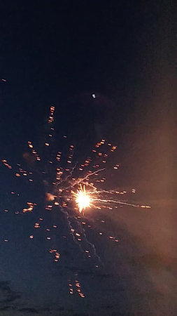 fireworks in the night sky, celebration of the New Year and Christmasの写真素材