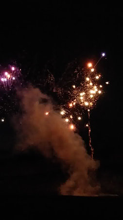 Fireworks in the night sky. New Year's Eve celebration.の写真素材