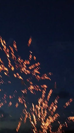 fireworks in the night sky with a lot of sparks and fireworkの写真素材