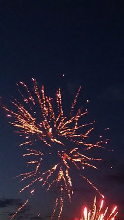 Fireworks in the night sky, New Year's Eve celebration.の写真素材