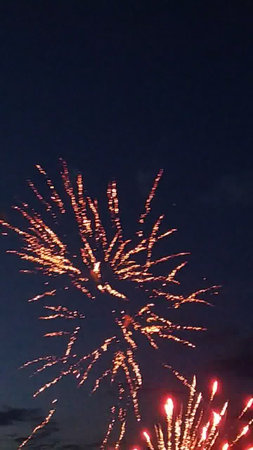 Fireworks in the night sky with a lot of sparkles and fireworksの写真素材