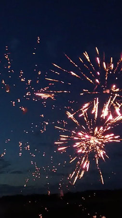 Fireworks in the night sky, celebrating the new year and Christmasの写真素材