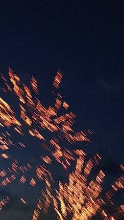 Fireworks in the night sky as a background, close-upの写真素材