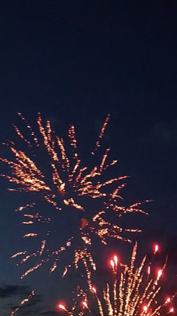 Fireworks in the night sky, New Year and Christmas celebration.の写真素材