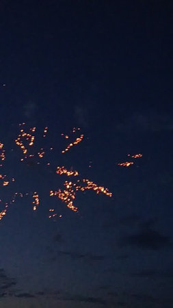 Fireworks in the night sky, New Year's Eve celebration.の写真素材