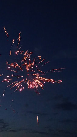 Fireworks in the night sky, celebration of New Year and Christmasの写真素材