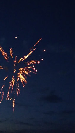 Fireworks in the night sky, New Year's Eve celebration.の写真素材