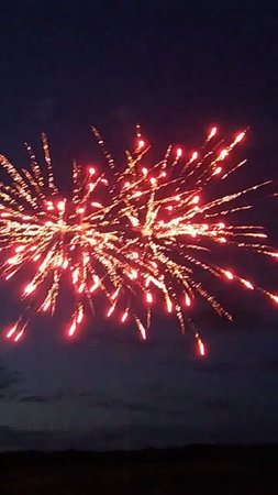 Fireworks in the night sky, New Year's Eve celebration.の写真素材