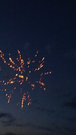 Fireworks in the night sky, celebrating New Year and Christmas.の写真素材