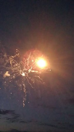 Fireworks in the night sky. New Year's Eve celebration.の写真素材
