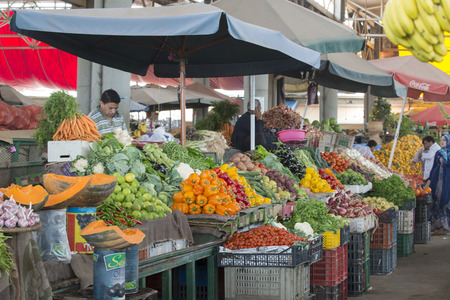 Sellers offer fruit and vegetables in the Suk - city market  on 28 August 2014 in Agadir, Maroccoのeditorial素材