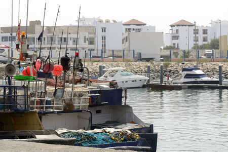 View of fishing boats in Essaouira port on 27 August 2014 in Agadir, Marocco. Morocco is one of the largest producers of sardines in the world.のeditorial素材