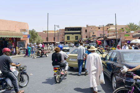 Tourists visiting Marrakesh medina quarter on 24 August 2014 in Marrakesh, Morocco.のeditorial素材