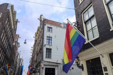 Gay rainbow flag in the city center on 26 July 2014 in Amsterdam, The Netherlands.のeditorial素材