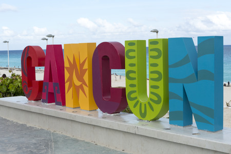 CANCUN inscription in front of the Playa Delfines beach on 18 January 2015 in Cancun, Mexico. This is one of the best beaches in the Mexico.のeditorial素材