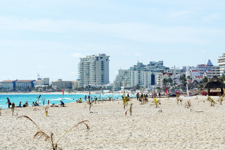 Tourists enjoy the sunny weather and relaxing on the beautiful beach on 18 January 2015 in Cancun, Mexico. This is one of the best beaches in the Mexico.のeditorial素材