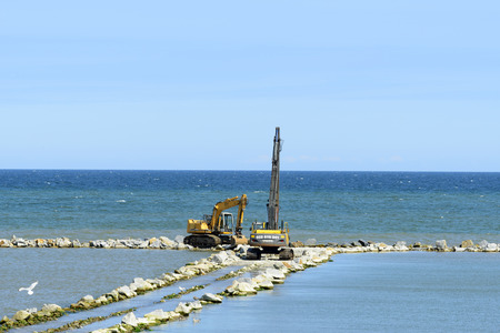 Workers are building an artificial reef is Facilitate the construction of the beach on 7 July 2015 in Ustka, Poland.のeditorial素材