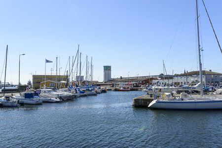 View of the marina full of sailing boats in summer sunny day on 14 August 2015 in Svaneke on Bornholm Island, Denmark.のeditorial素材