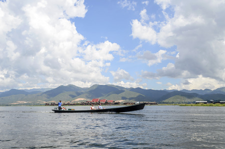 Tourists take part in a boat trip on November 2, 2015 on Inle Lake, Myanmar BURMA. It is famous place for tourism to visit the Inle lakeのeditorial素材