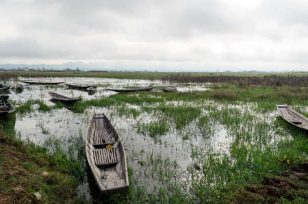 Old long boat on Inle lake, Shan State, Myanmar BURMA. This is a traditional transport in this areaの写真素材