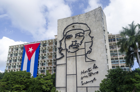 Cuban flag and relief of Che Guevara on facade of Ministry of Interior on the Plaza de la Revolucion...