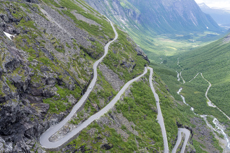 The Trollstigen road between the mountains, Norway. The most winding and dangerous road in Europe.の写真素材