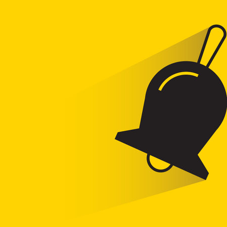 hand bell with drop shadow on yellow backgroundのイラスト素材